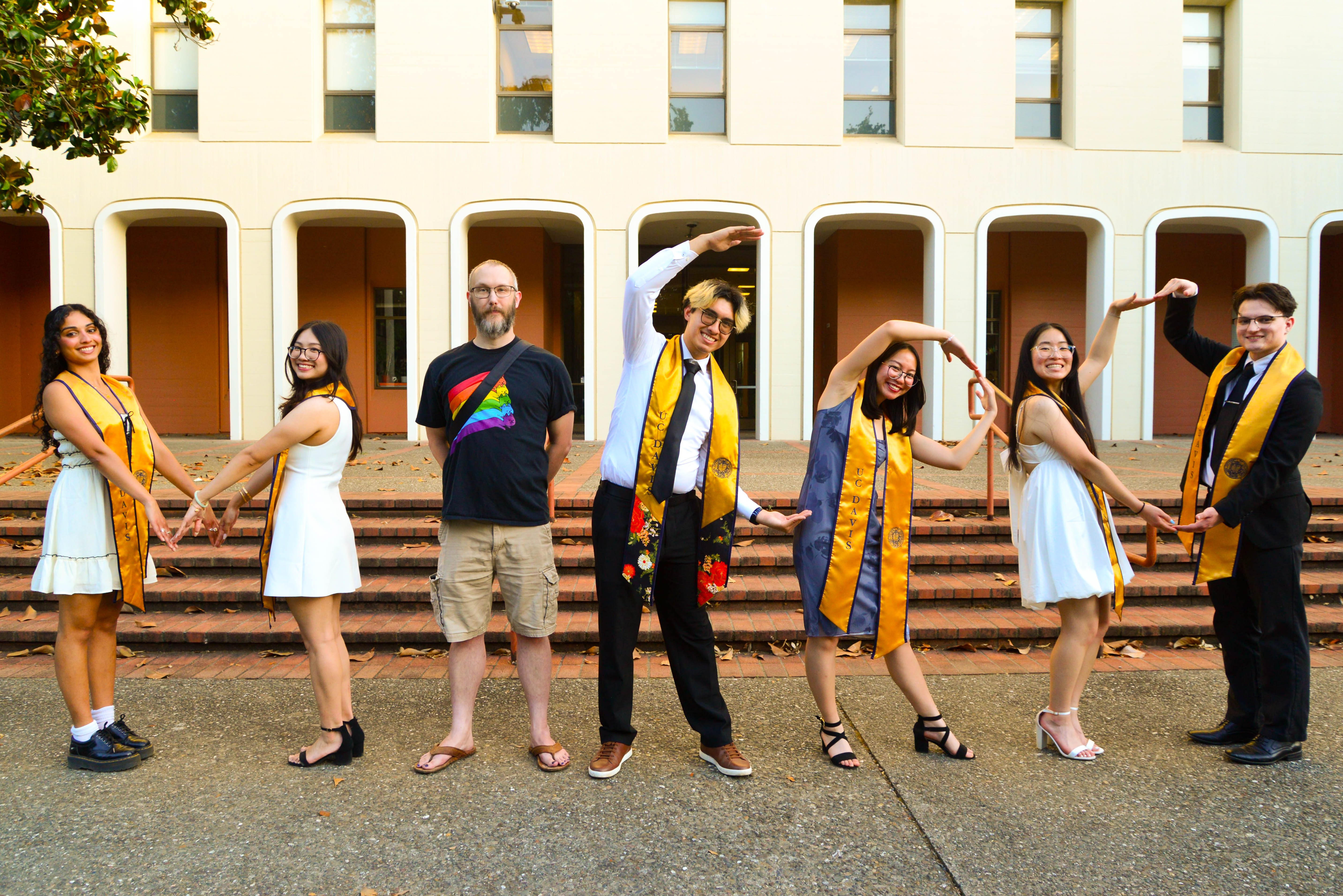 2025 graduates posing to form the letters for "MICRO".